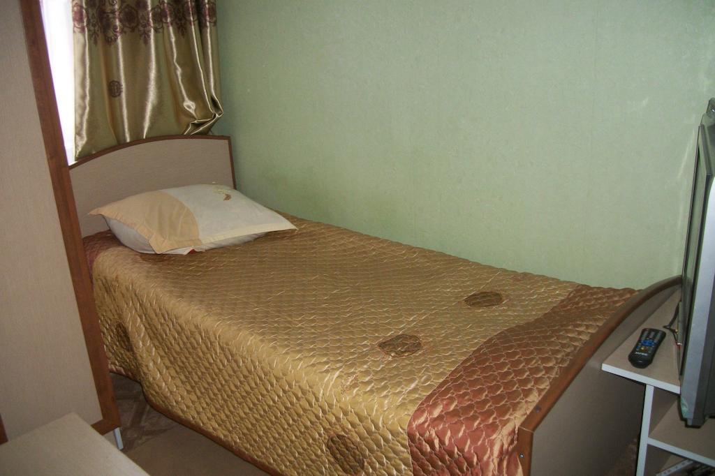 Hotel Enirest Karakol Habitación foto